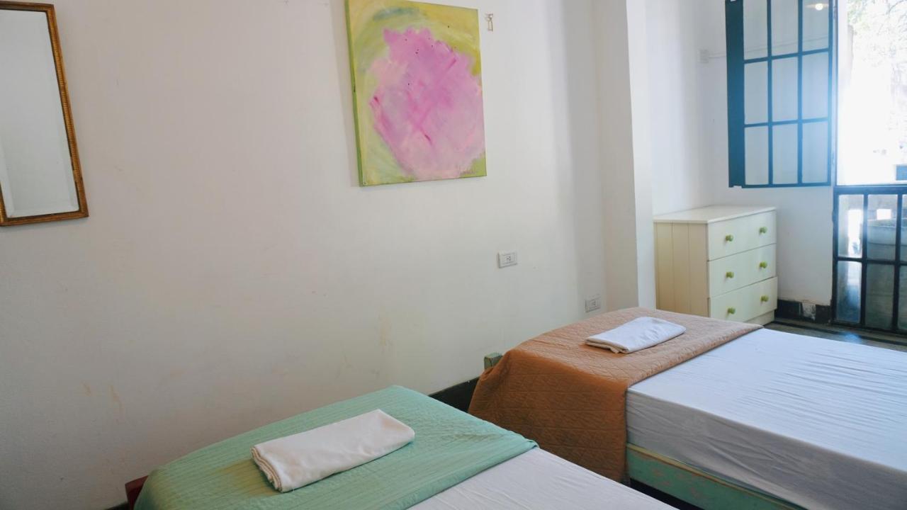 Hostel Posada Juan Ignacio Rosário Quarto foto